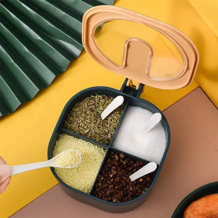 Top view of open spice box with 4 compartments and spoons - DrutoBD