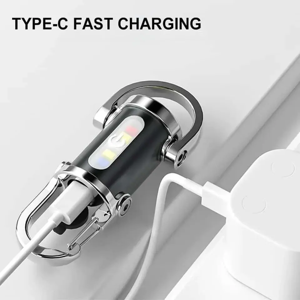 Compact Type-C emergency keychain light charging a smartphone - DrutoBD