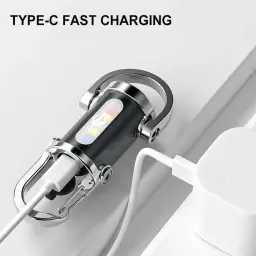 Compact Type-C emergency keychain light charging a smartphone - DrutoBD