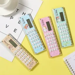 Bitoon Ruler Calculator in four cute cartoon colors laid out on a yellow surface