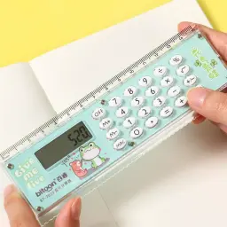 Hands holding a transparent mint green 15cm scale with built in 8 digit screen over a white notebook
