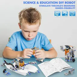A young boy assembling the educational solar toy on a table following the instruction manual